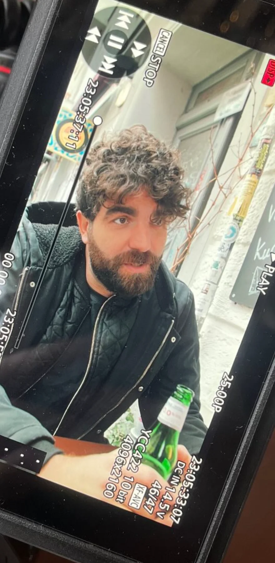Edu Balestra on set, seen on a camera monitor