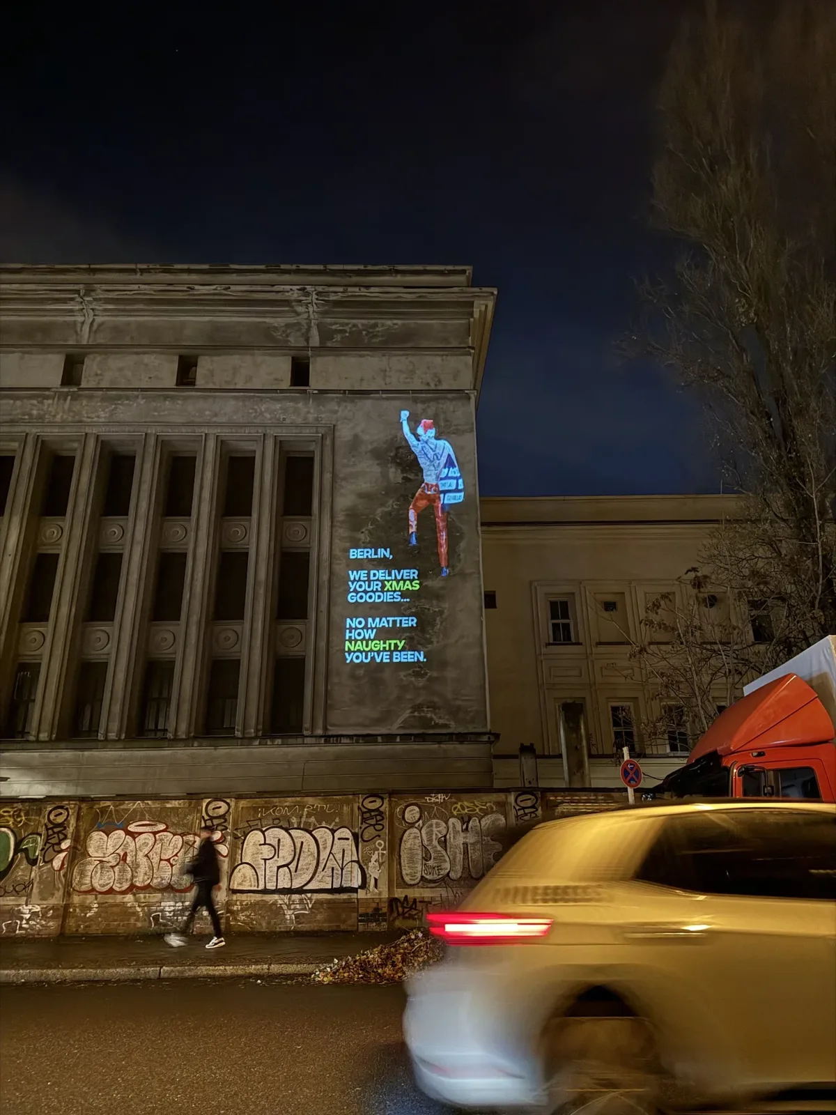 Naughty List Santa projected on Berghain