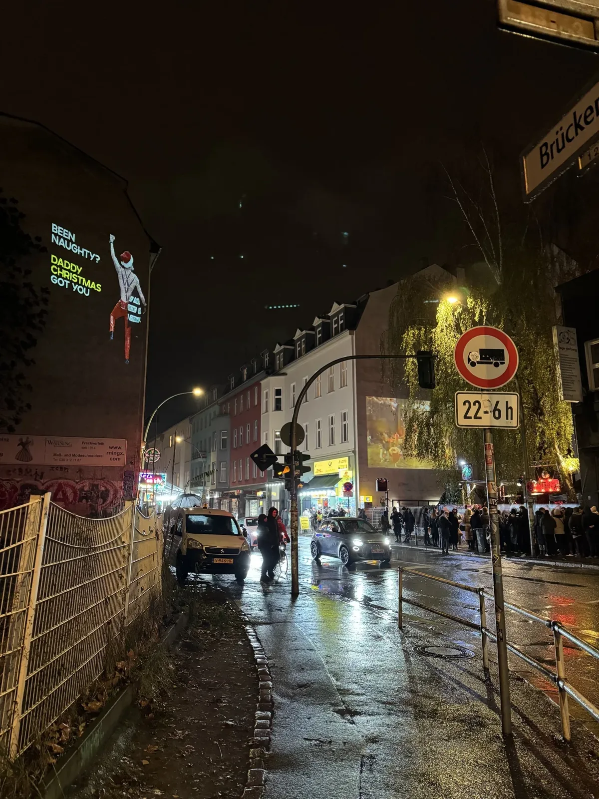 Naughty List Santa projected near KitKat Club